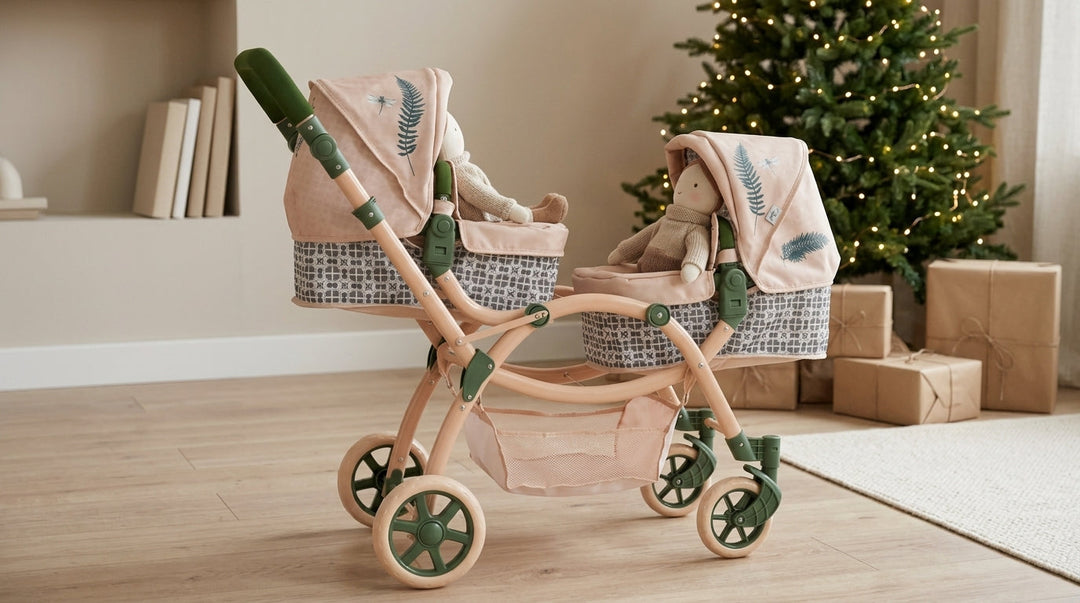 Roma RHS Twin Dolls Pram in Fern with two dolls in a living room at Christmas