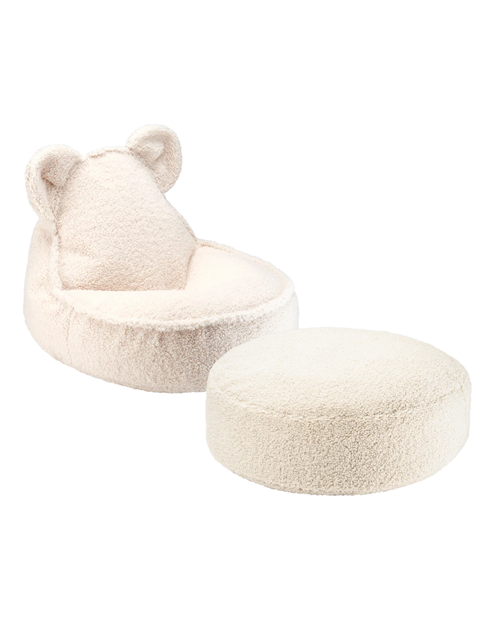 Blush pink bear-shaped beanbag chair with matching round ottoman on plain background