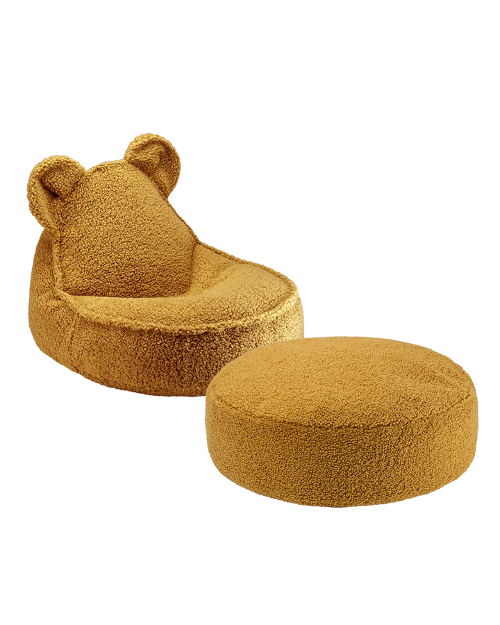 Ivory Wigiwama bear chair and coordinating cream round ottoman isolated view