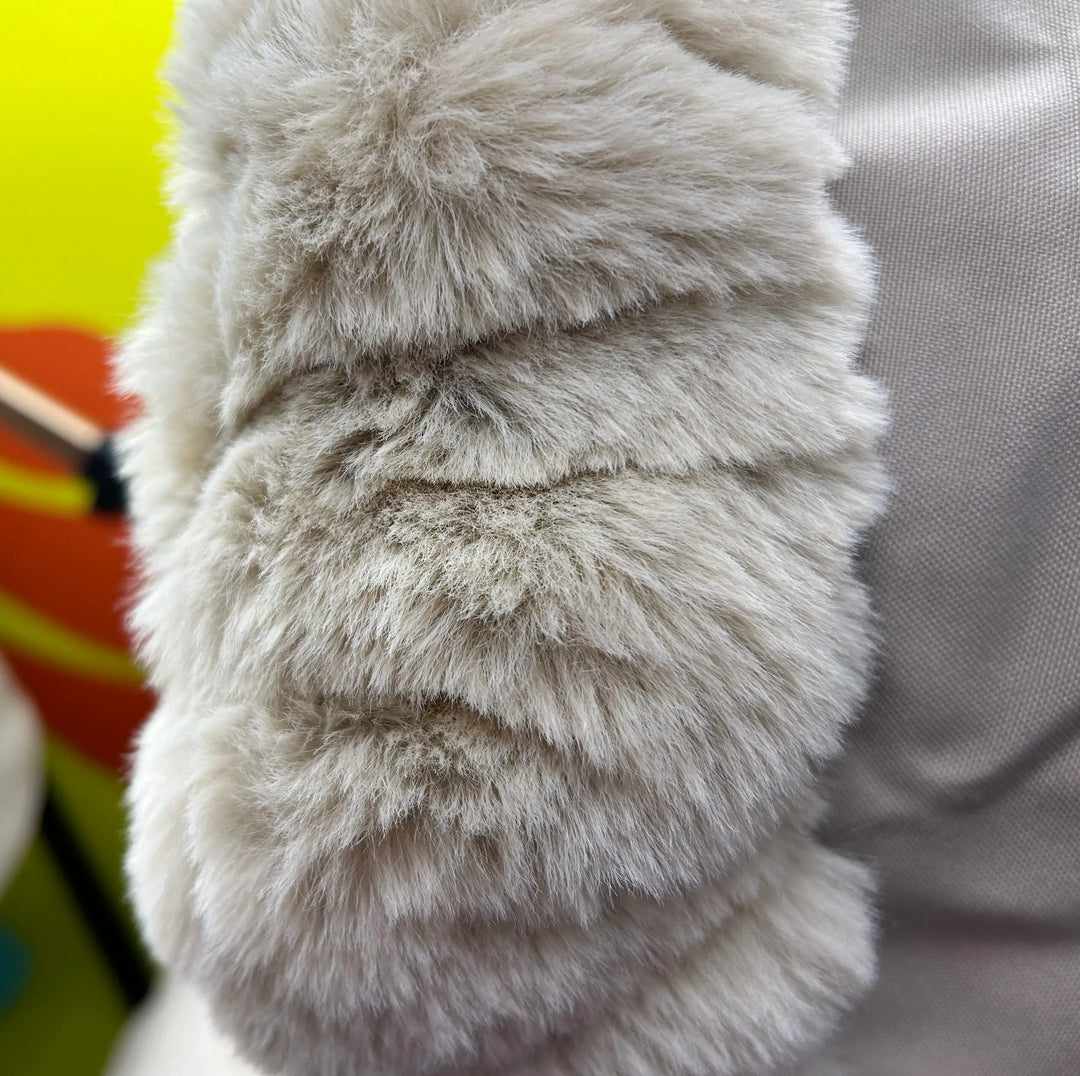 Roma Pram Hood Fur close up showing ribbon tie and elasticated fit