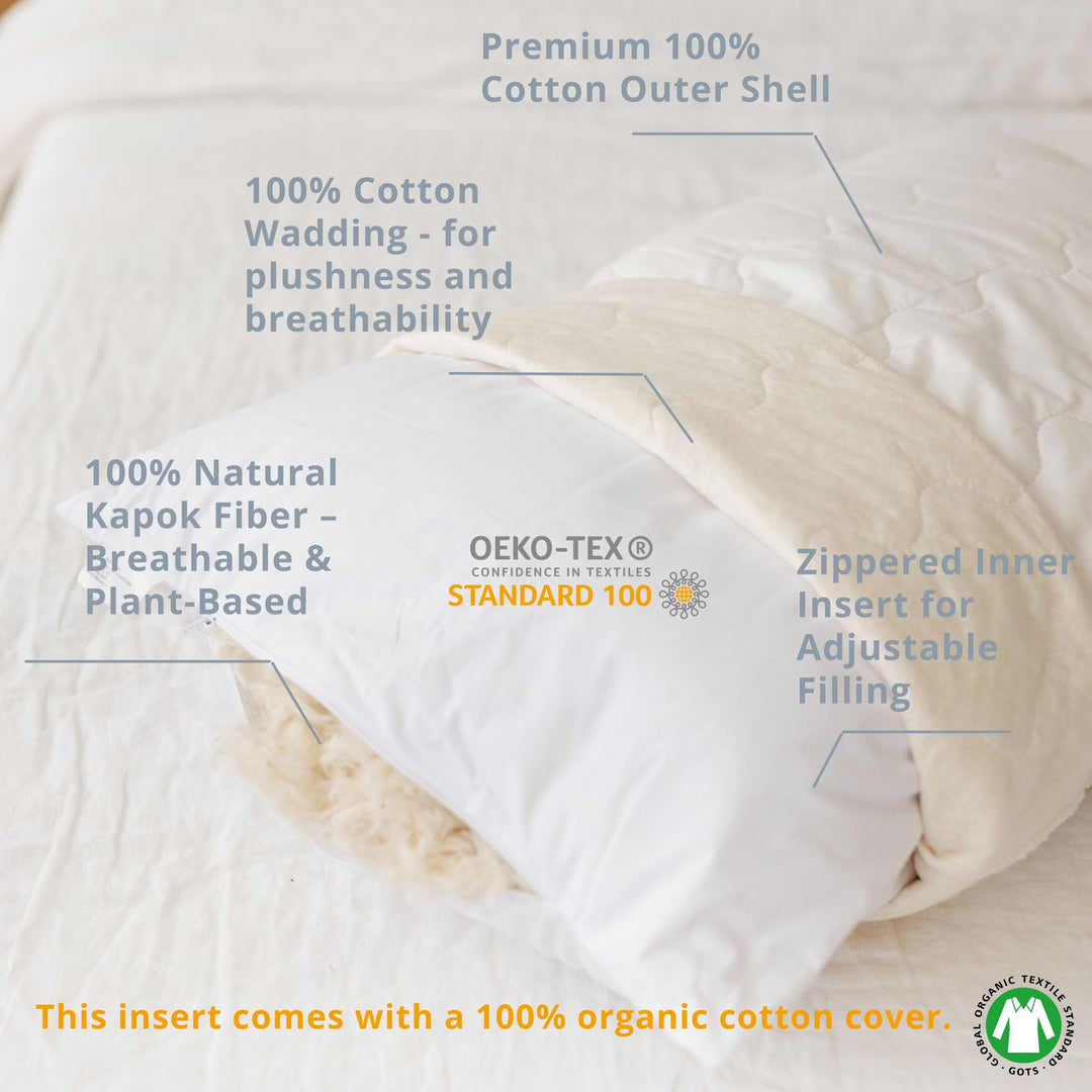 MINICAMP Full Body Pillow, Milk White floral organic cotton cover, styled on a bed