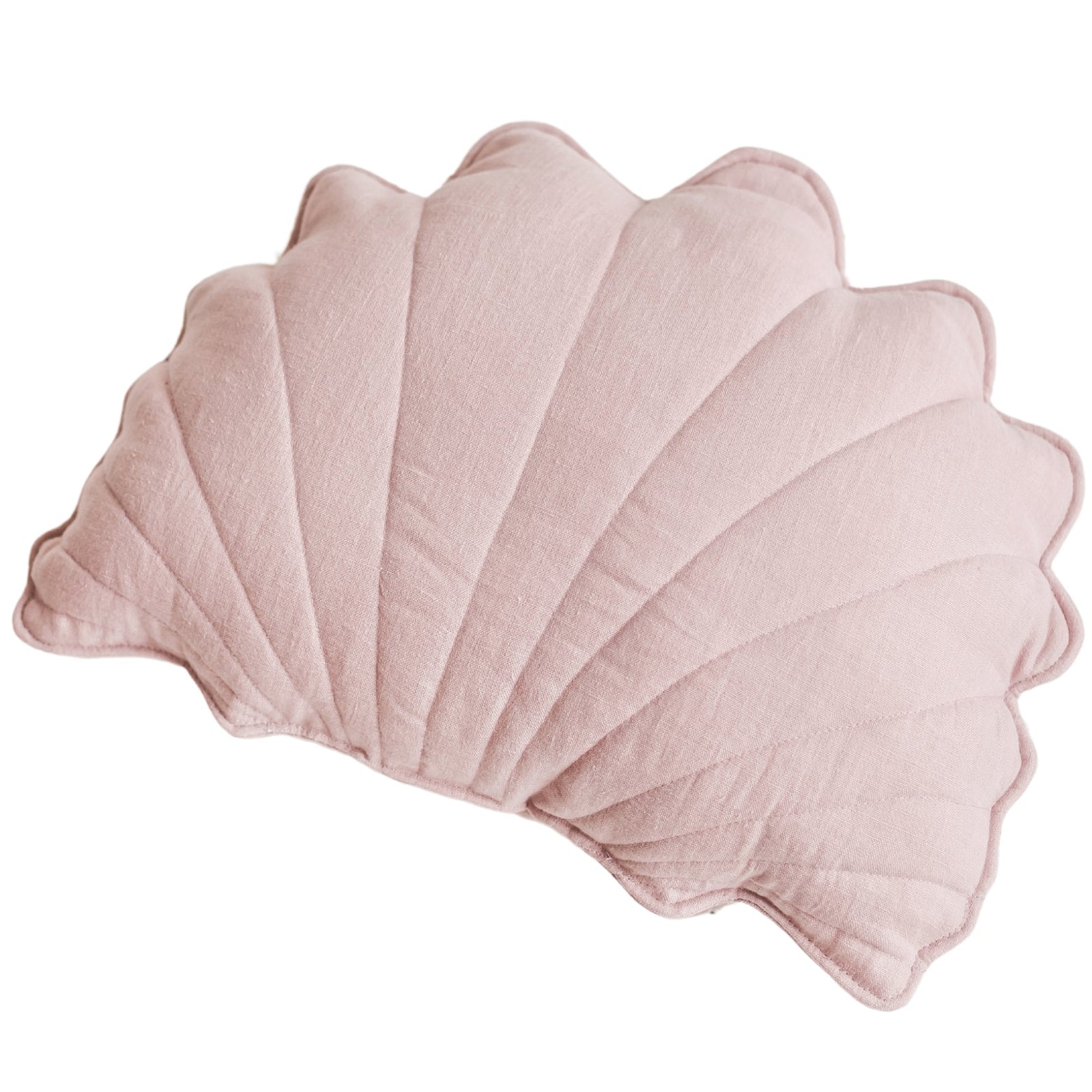 Pink linen seashell cushion styled with a matching starfish cushion on a rattan chair
