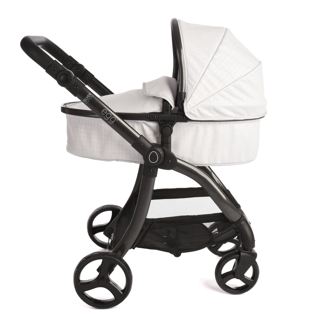 Roma Egg® Dolls Pram in Houndstooth Silver, side view of the toy pram