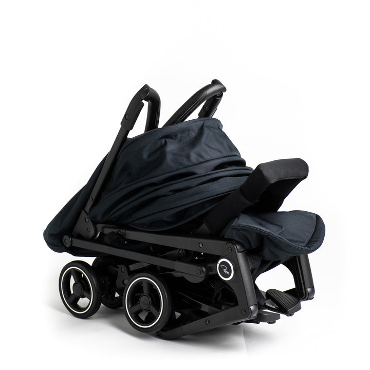 Roma Capsule³ raincover fitted over stroller