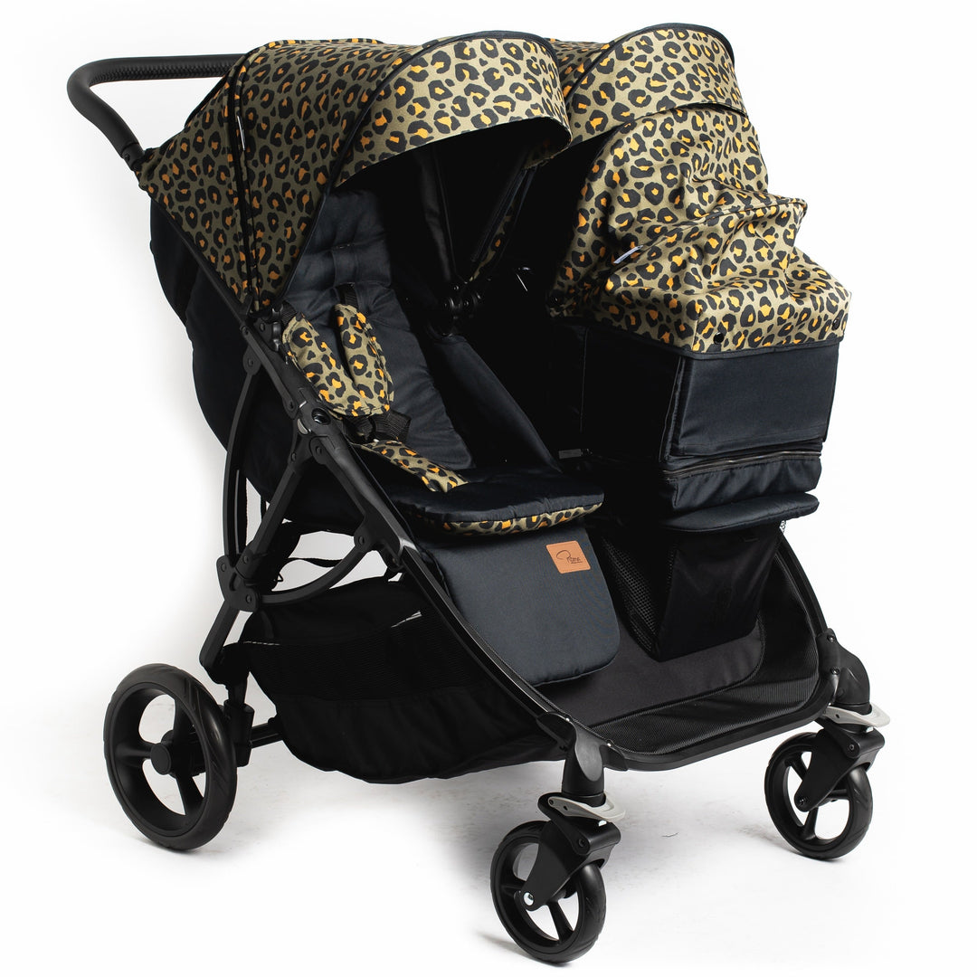 Roma Gemini 2 pushchair fitted with one Khaki Leopard carry cot