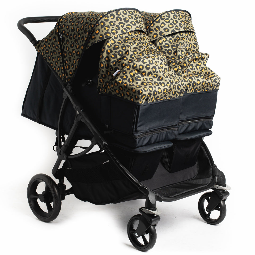 Roma Gemini 2 pushchair fitted with two Khaki Leopard carry cots for twins