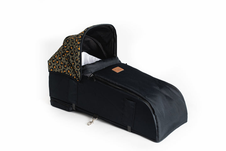 Roma Gemini 2 Carry Cot in Khaki Leopard, side view fitted to pushchair