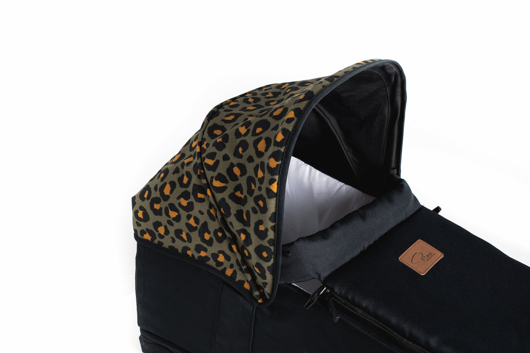 Roma Gemini 2 Carry Cot in Khaki Leopard, fitted to pushchair