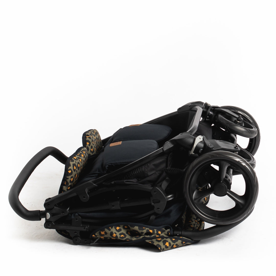 Roma Gemini 2 double pushchair in Khaki Leopard, folded on floor
