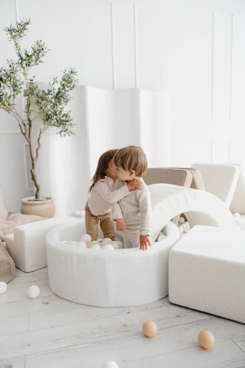 Monio for Kids Cream Boucle Round Ball Pit — lifestyle image in nursery setting