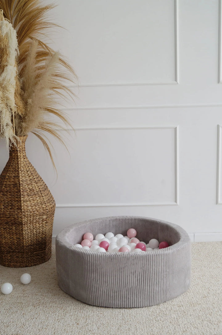 Monio for Kids Grey Corduroy Round Ball Pit — lifestyle image in neutral room setting