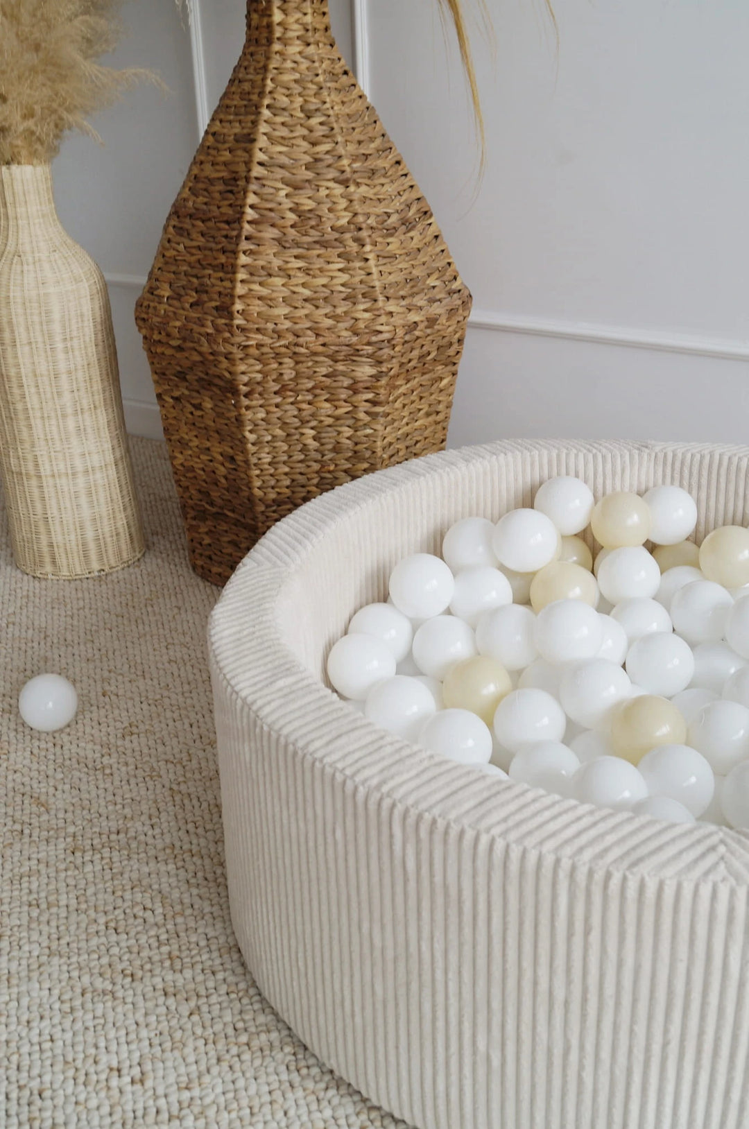 Monio for Kids Cream Corduroy Round Ball Pit — lifestyle image with child in play setting