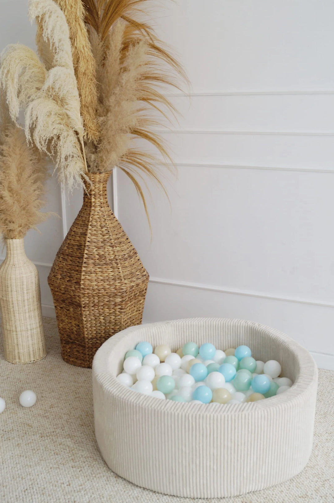 Monio for Kids Cream Corduroy Round Ball Pit — lifestyle image showing ball pit in use