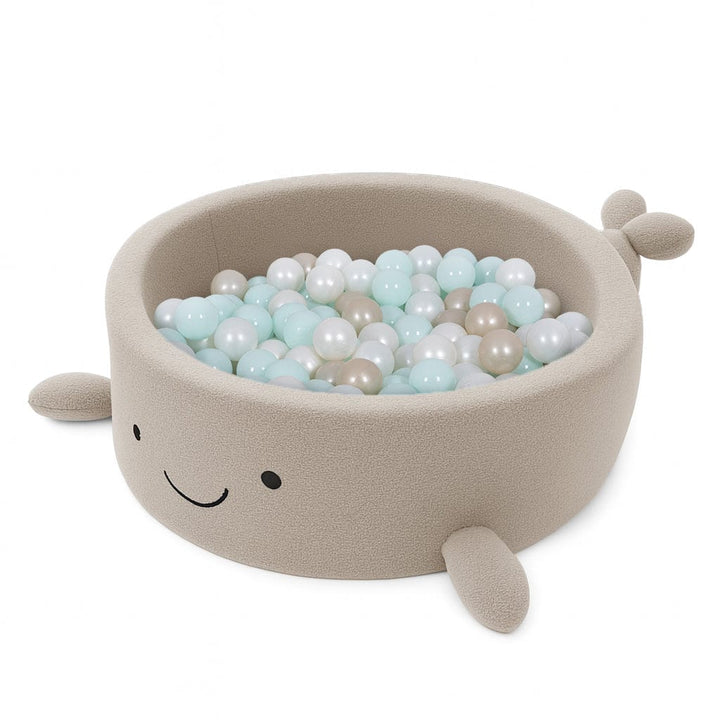 MeowBaby Oat Biscuit Beige boucle whale ball pit, front view of the fins and tail