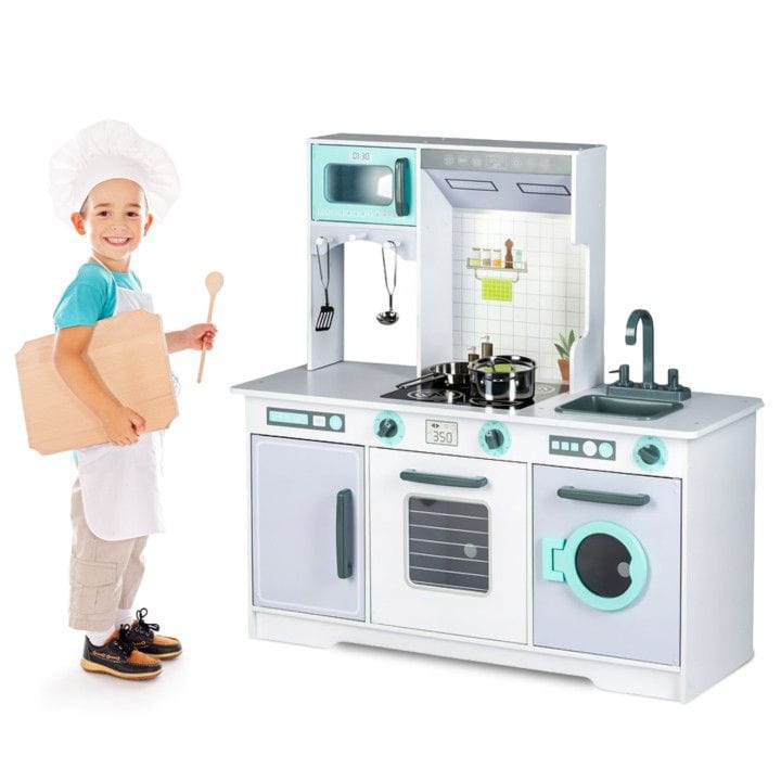 A child in a chef hat and apron beside the MeowBaby Grey &amp; Teal Wooden Play Kitchen