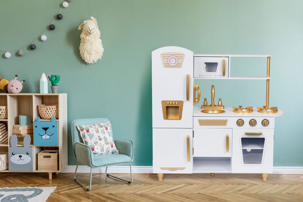 MeowBaby White &amp; Gold Wooden Play Kitchen styled in a green playroom setting