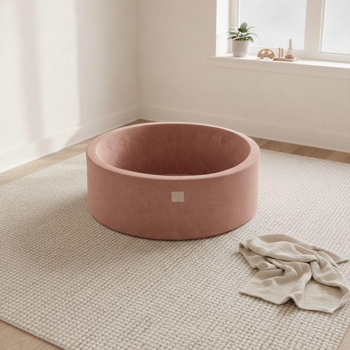 MeowBaby Beige Round Velvet Ball Pit on a rug in a bright playroom