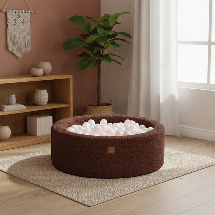 MeowBaby Dark Brown Bearly round ball pit in a warm living room corner