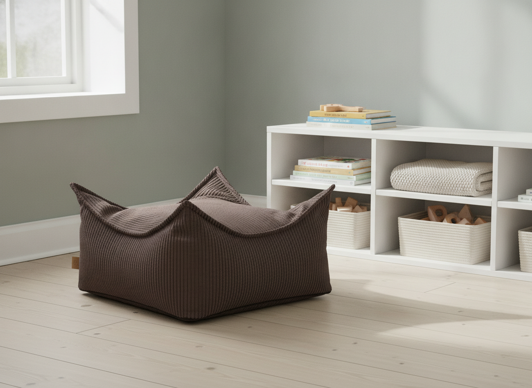 MeowBaby Square Puff corduroy floor pouf styled in a Scandinavian playroom beside a bookshelf
