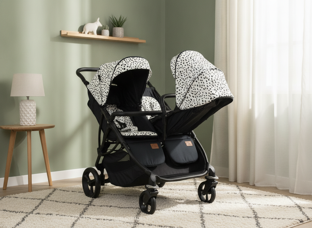 Roma Gemini 2 double pushchair in Dalmatian print with both seats reclined flat in a modern living room