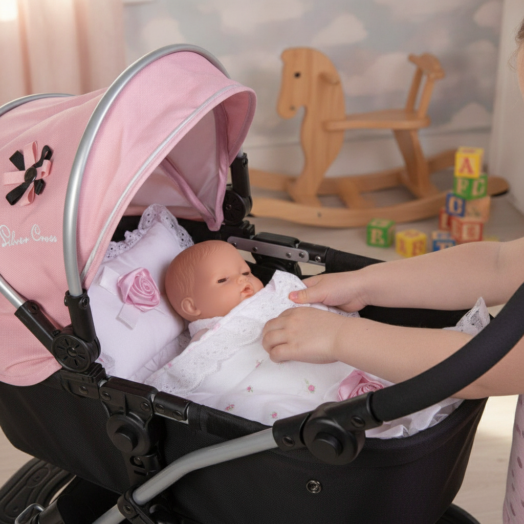 Child tucking a doll into a carrycot under the Roma white and pink rose bedding set