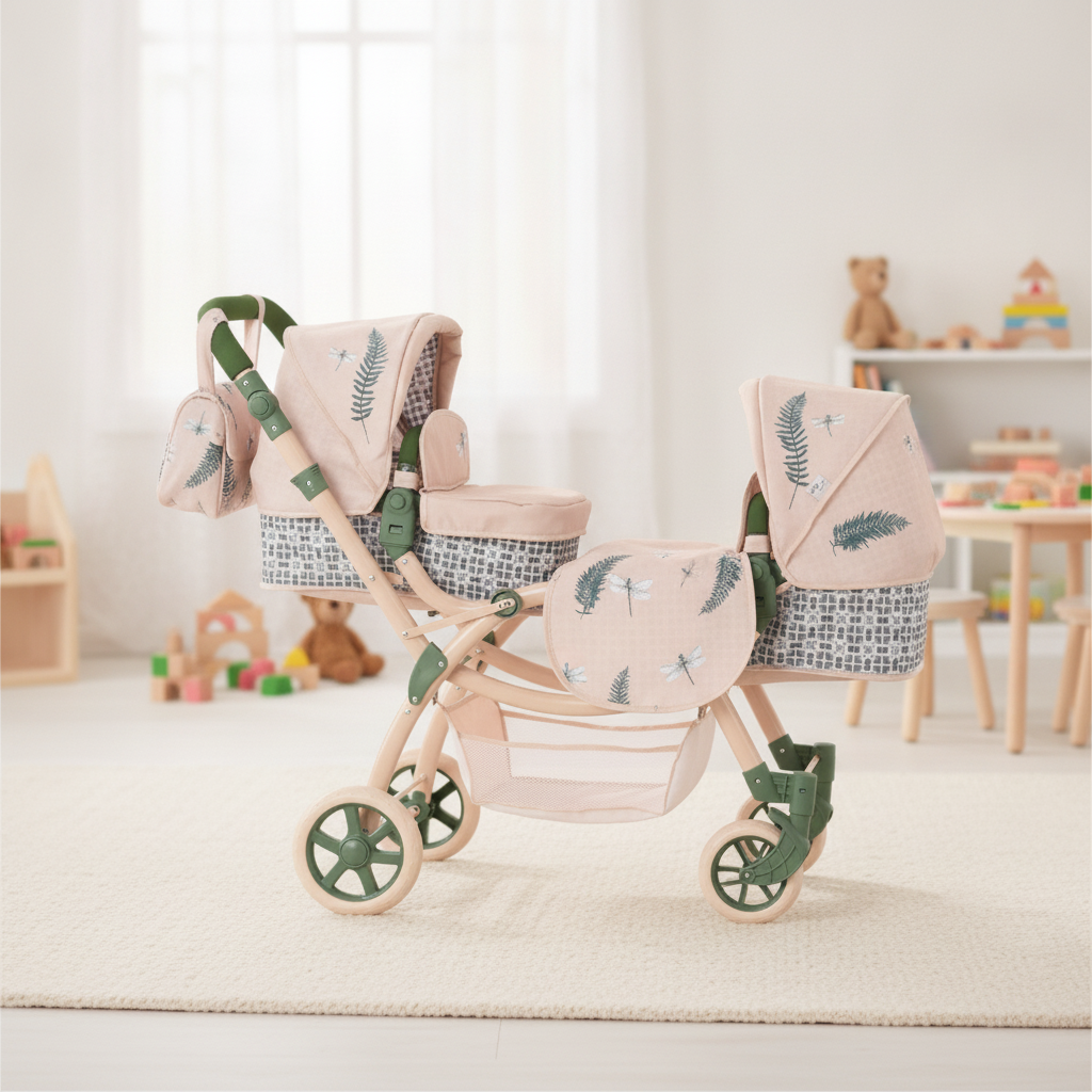 Roma RHS Twin Dolls Pram in Fern shown with its coordinating changing bag, aprons and shopping basket