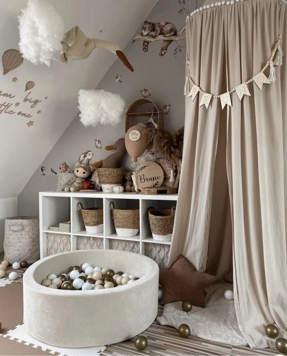 Monio for Kids Cream Velvet Round Ball Pit — lifestyle image in nursery setting