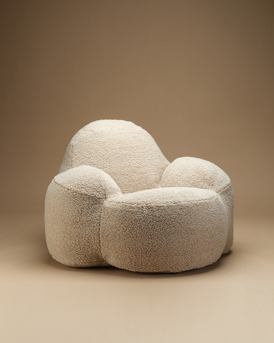 Biscuit Wigiwama Momo Chair styled in a bedroom setting