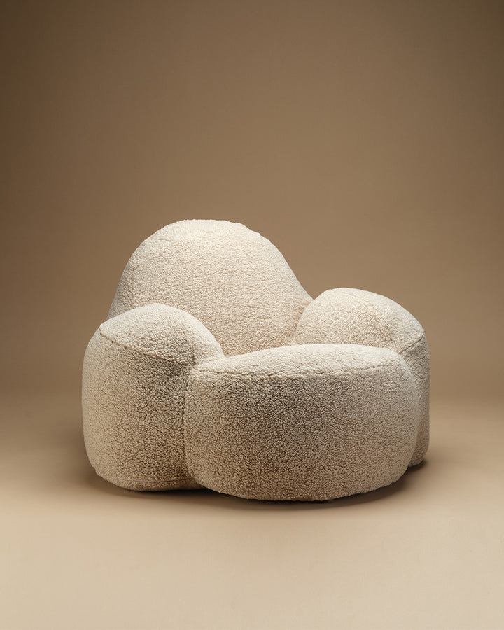 Biscuit Wigiwama Momo Chair styled in a bedroom setting