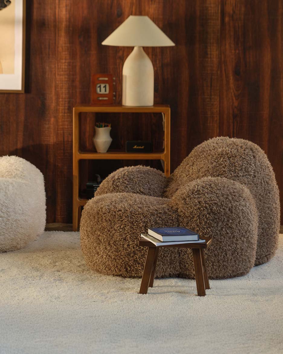 Truffle Wigiwama Momo Chair styled in a bedroom setting